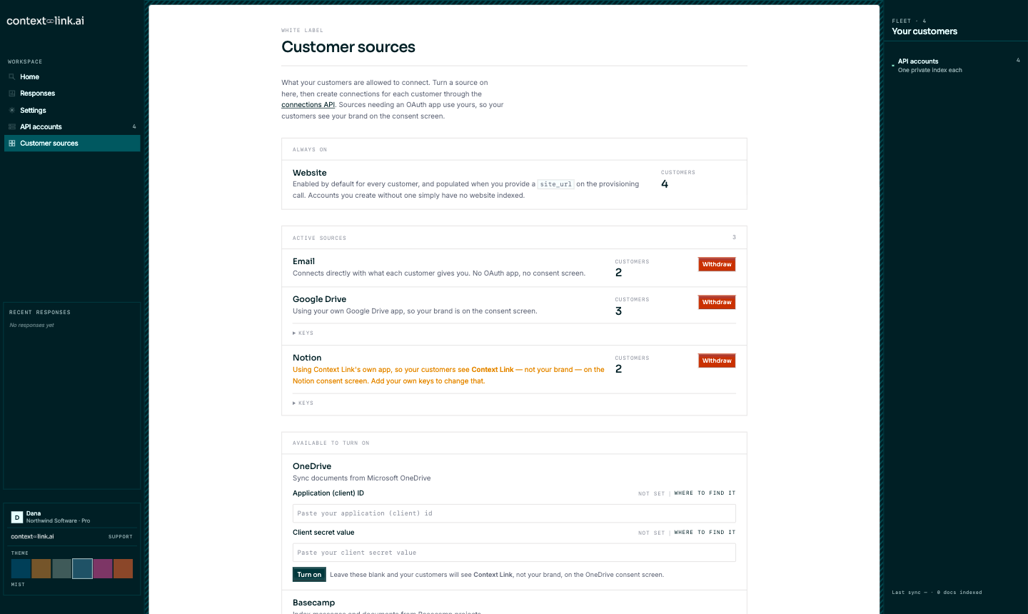 The Connection types screen. An always-on Website row with a count of 4 customers and no controls. Below it three active sources, each with a customer count and a Withdraw button: Email connecting directly, Google Drive on the partner's own OAuth app, and Notion warning in orange that it is falling back to Context Link's app. Under those, an available-to-turn-on list starting with OneDrive's client ID and client secret fields.